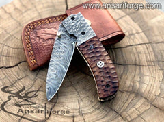 Hand-forged Damascus Steel Pocket Knife - Discover a masterpiece of craftsmanship. Featuring a razor-sharp blade, elegant rosewood handle, and durable construction. Perfect for outdoor adventures or everyday carry.