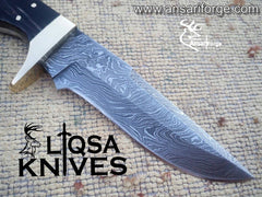 600 layers drop point blade of custom Damascus steel hunting knife.