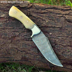 Handmade Damascus Hunting Knife with twist pattern blade, full tang, stainless steel bolsters, camel bone handle, and cowhide leather sheath