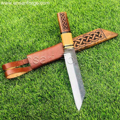 Viking Seax Knife Beagnoth by Ansari Forge with hand-forged 5160 high carbon steel blade, rosewood and olive wood handle featuring Nidhogg Viking dragon carvings, and genuine cowhide leather sheath with dragon hand carving.