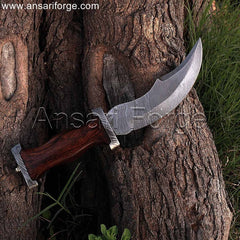 Pirate dagger with Damascus steel blade, walnut wood handle, and leather sheath