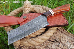 Custom handmade Damascus steel cleaver chopper chef knife Damascus steel 1095 & 15n20 hand forged rain drop pattern cleaver blade with 58 - 60 HRC hardness . Rosewood handle and bolsters . Comes with genuine cowhide leather sheath