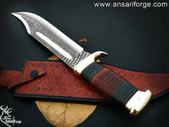custom Crocodile Dundee Bowie Knife. D2 tool steel blade with distinct hammer forge marks gleams in the light. Brass hilt and pommel add a touch of elegance, while the genuine leather and buffalo horn handle showcase its luxurious comfort.