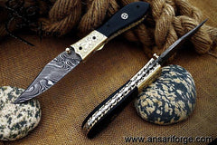 Damascus steel pocket knife buffalo horn handle and leather pouch