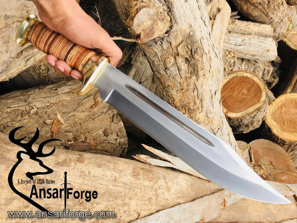 Crocodile Dundee Knife with D2 steel blade, brass hilt and pommel, and leather + buffalo horn handle.