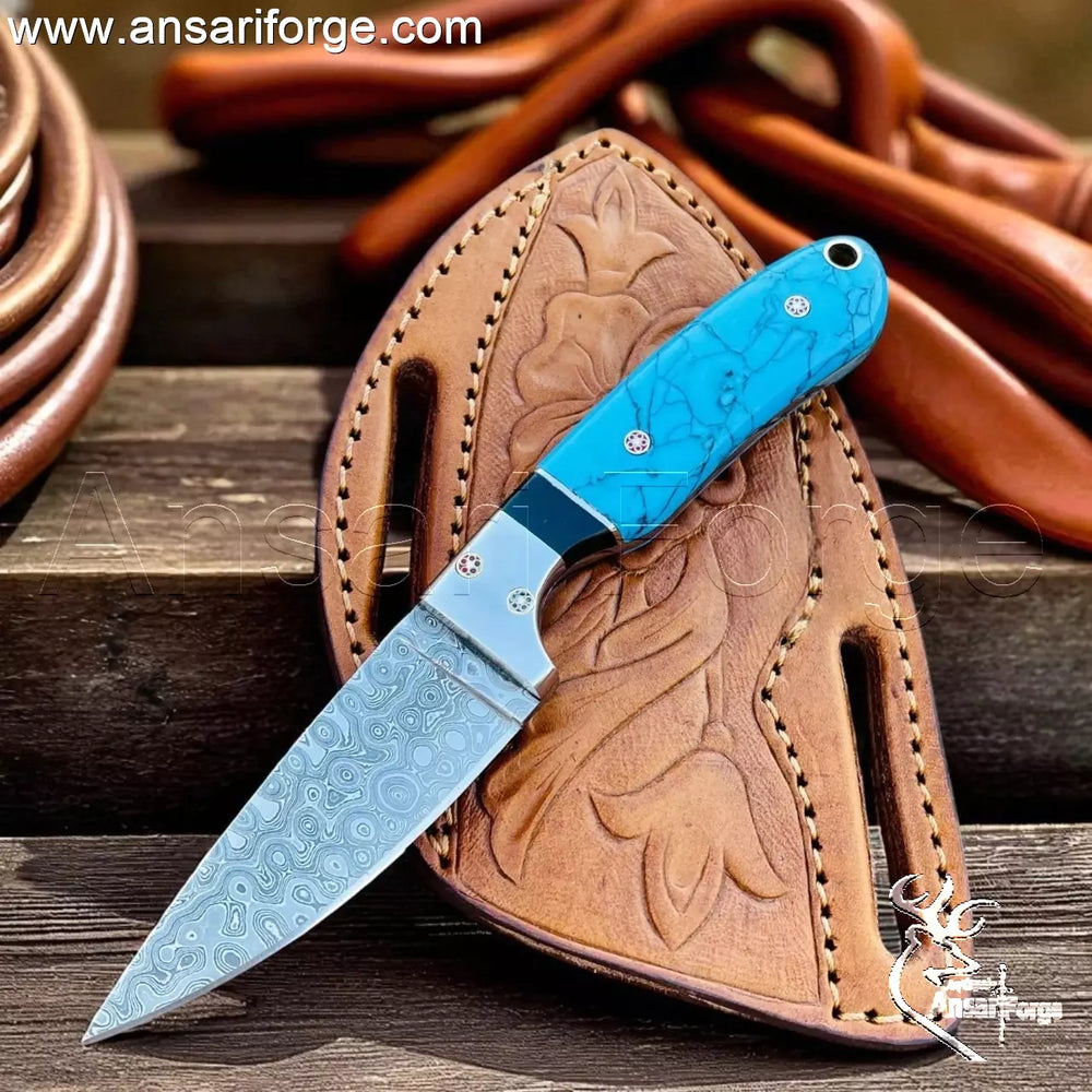 urable Recon Stone handle and stainless steel bolsters on the Damascus Ranch Knife.