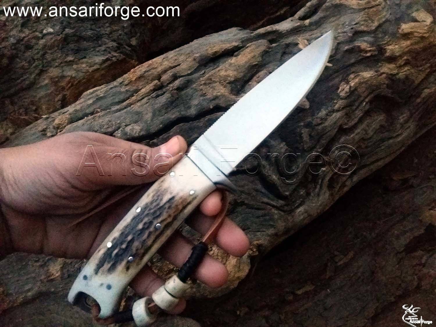 Handmade Loveless Knife with a D2 steel blade, stag handle, and leather sheath.