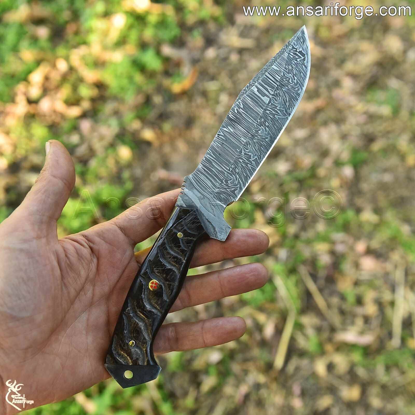 "Close-up of 356-layer twist pattern Damascus steel blade on Deer Skinning Knife - Razor sharp hunting tool.