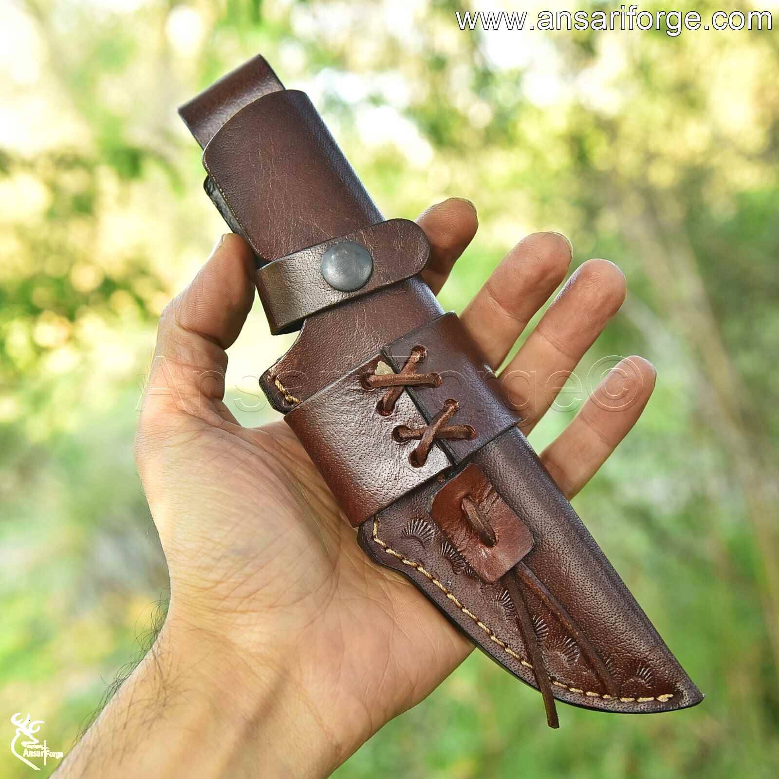9-inch deer skinning knife, showcasing the full tang and the craftsmanship of the hunting knife with leather sheath.