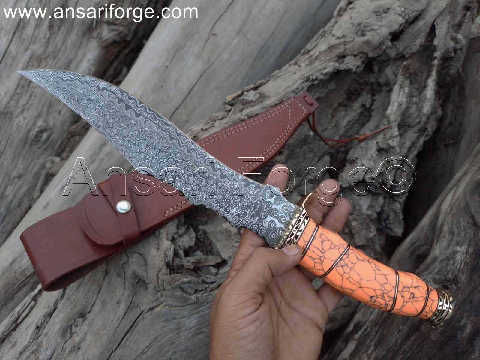 Real Damascus Knife with a beautiful rain drop pattern on the blade, showcasing its craftsmanship and design.