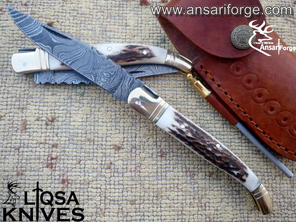Hand-forged Damascus Laguiole knife with Sambar stag antler handle.