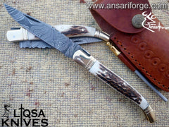 Hand-forged Damascus Laguiole knife with Sambar stag antler handle.