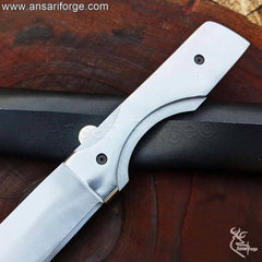 Stainless steel handle of Dexter Morgan knife.