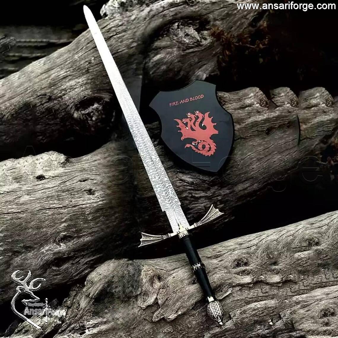 Studio shot of the Dark Sister sword replica held by a collector, emphasizing its size and 56 HRC hardness.