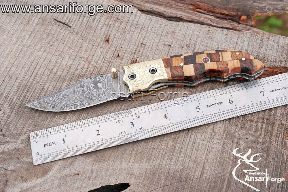 Ansari Forge EDC knife with Damascus steel blade and pure brass engraved bolsters.