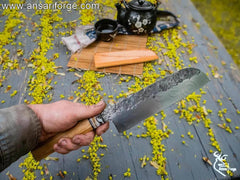 Best Japanese chef knife, a Santoku knife from Ansari Forge, showing its full tang 80CRV2 steel blade.