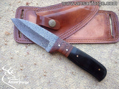 Black Eagle X Handmade Damascus Steel Hunting Knife with Water Buffalo Horn Handle and Horizontal Leather Sheath.