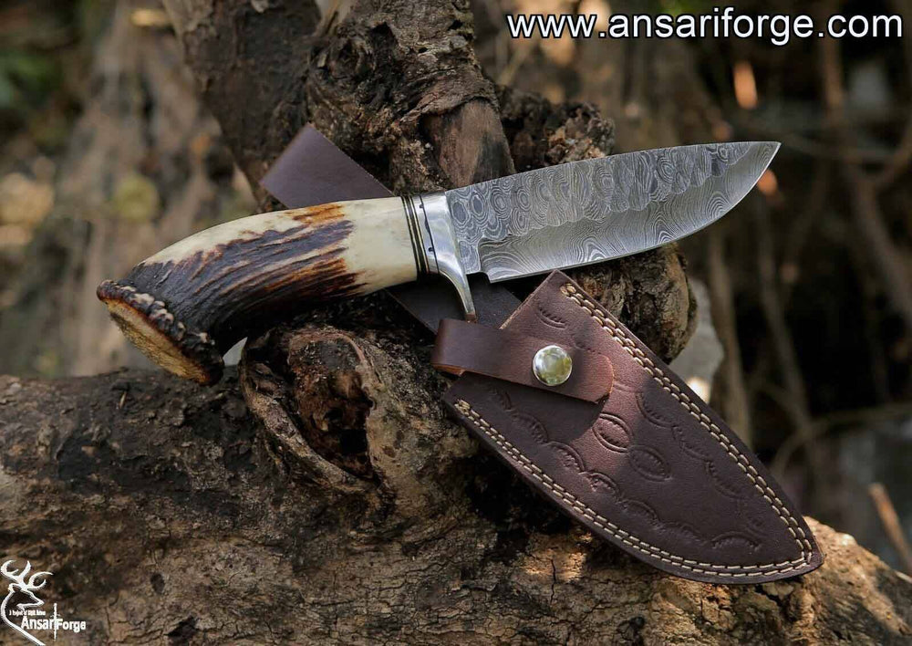 Handmade Damascus hunting knife with antler handle & Leather sheath.