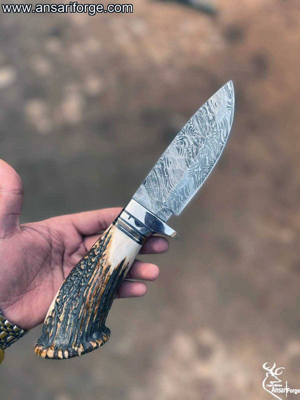 Close-up of Handmade Damascus Hunting Knife with Twist Pattern.