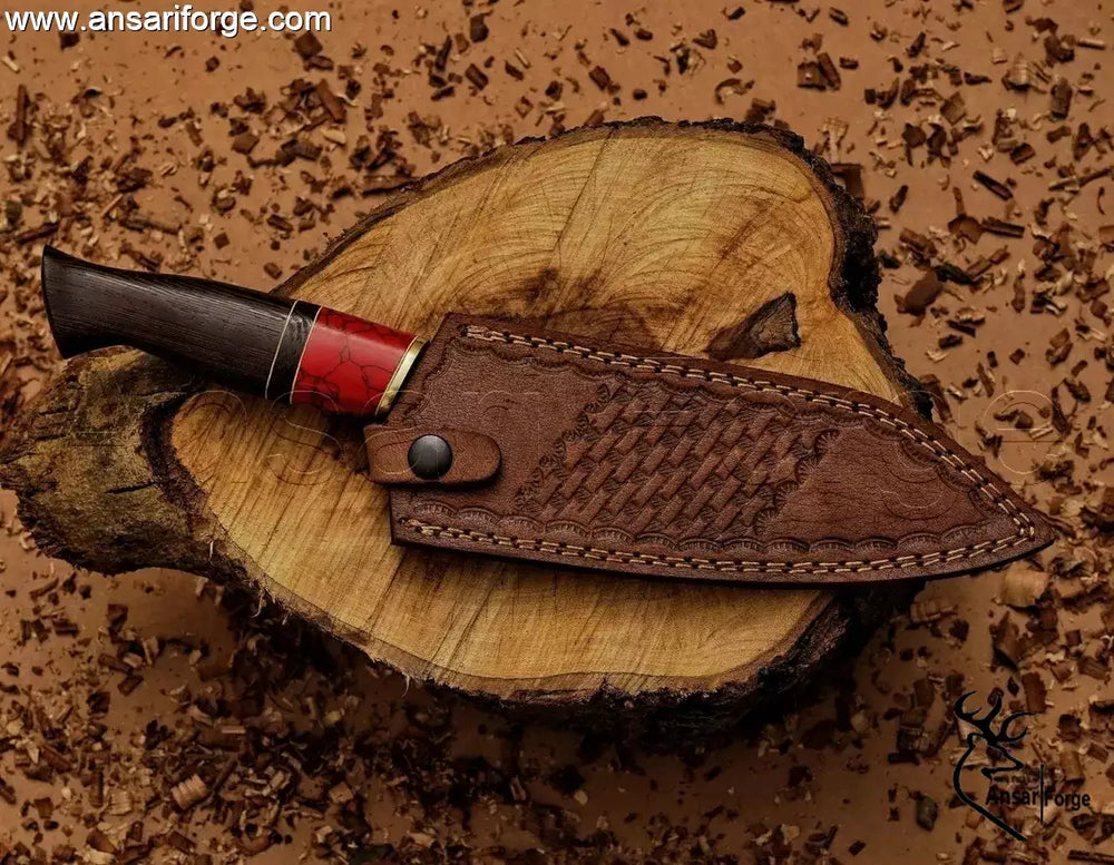 Copper Damascus steel chef knife in genuine cowhide leather sheath.