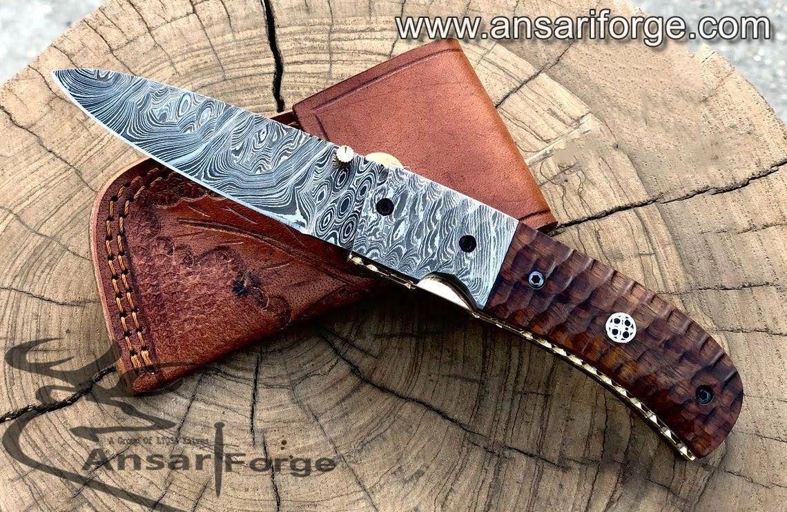 Hand-forged Damascus Steel Pocket Knife - Discover a masterpiece of craftsmanship. Featuring a razor-sharp blade, elegant rosewood handle, and durable construction. Perfect for outdoor adventures or everyday carry.