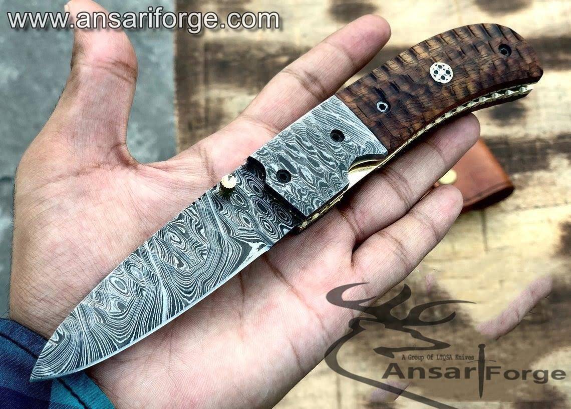 Hand-forged Damascus Steel Pocket Knife - Discover a masterpiece of craftsmanship. Featuring a razor-sharp blade, elegant rosewood handle, and durable construction. Perfect for outdoor adventures or everyday carry.