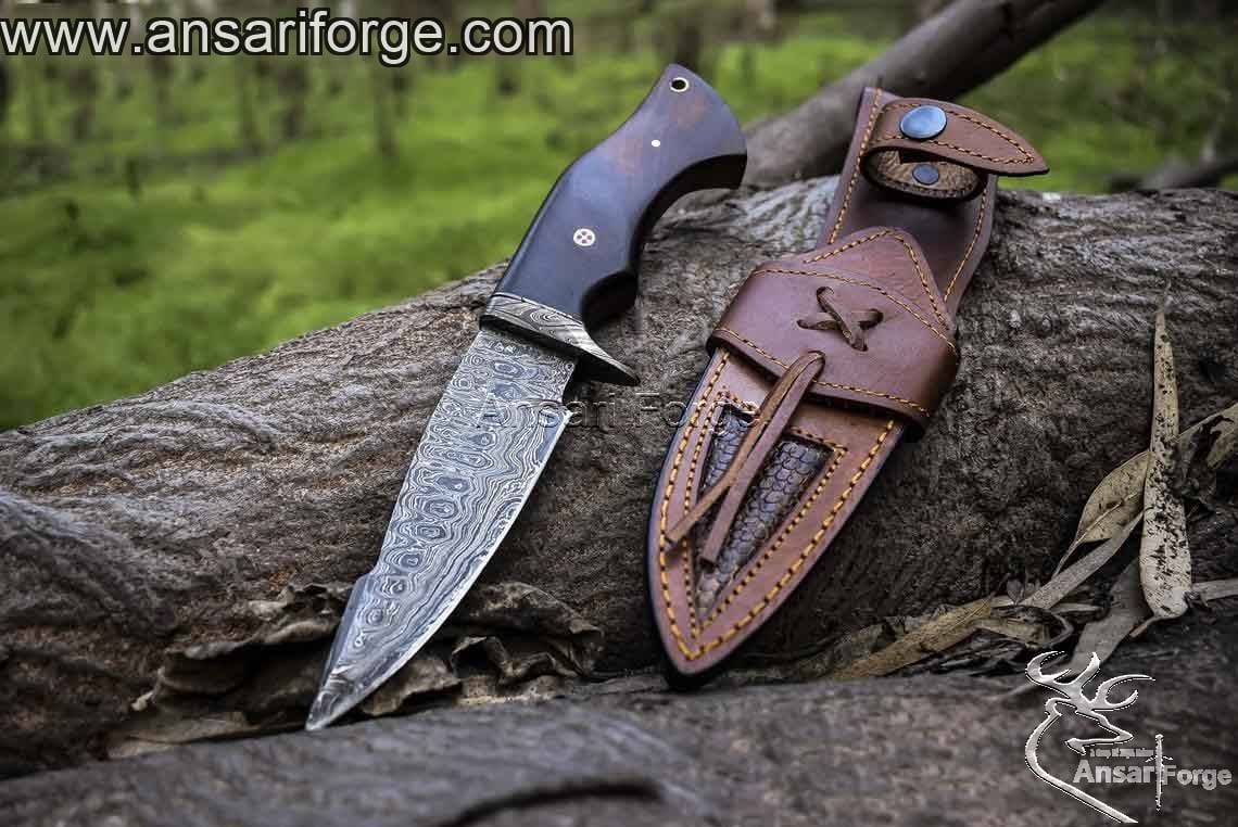 Custom made Damascus steel hunting with Damascus guard & leather sheath.