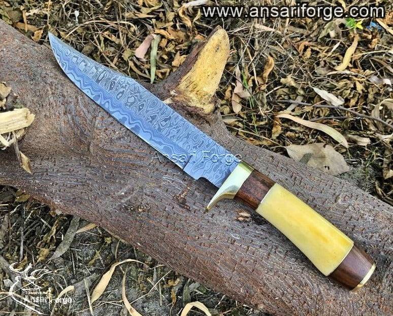 Damascus steel handmade hunting knife Bowie with yellow bone handle & brass finger guard.
