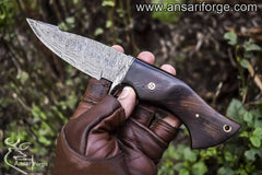 A hunter showing perfect size of Damascus hunting knife