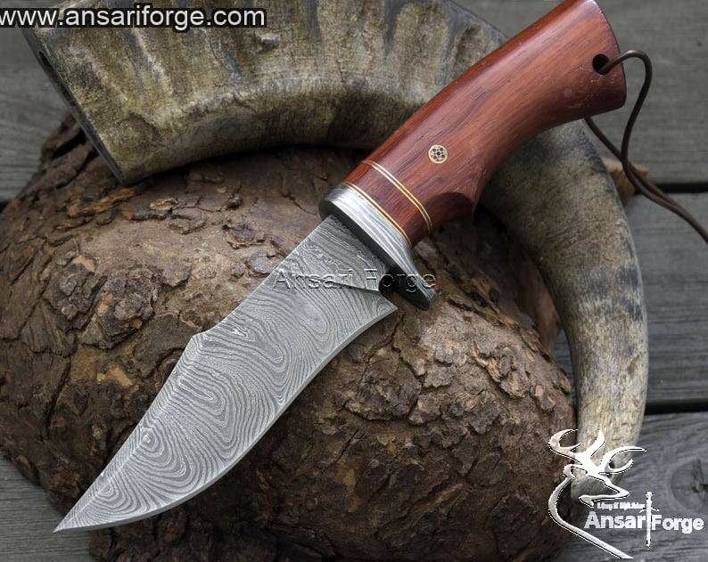 Concealed horizontal carry knife with Damascus steel blade, rosewood handle, and leather sheath.