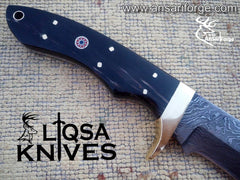 Buffalo horn handle and bronze hilt of Damascus hunting knife.