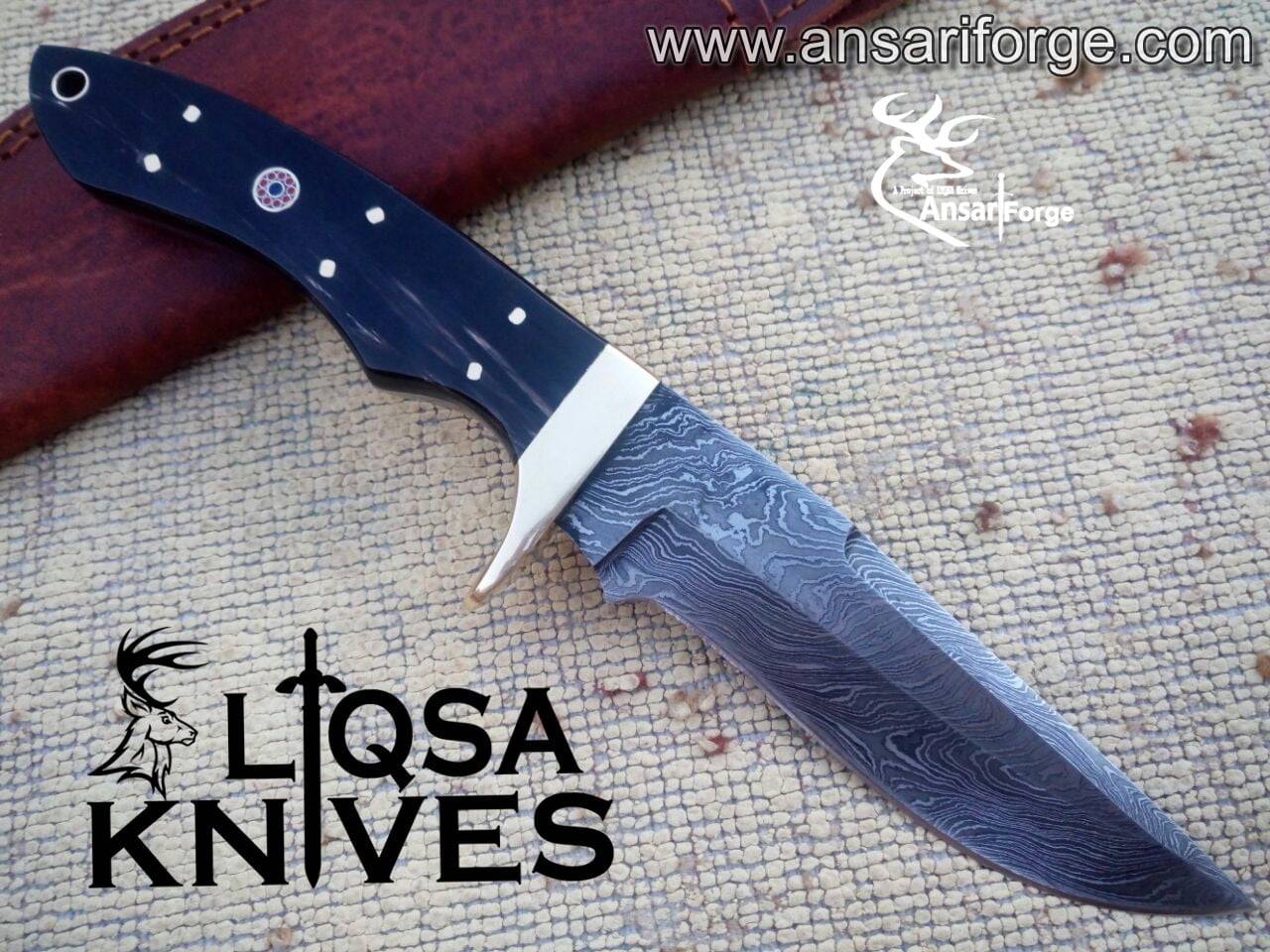 Handmade Damascus steel hunting knife by Ansari forge.