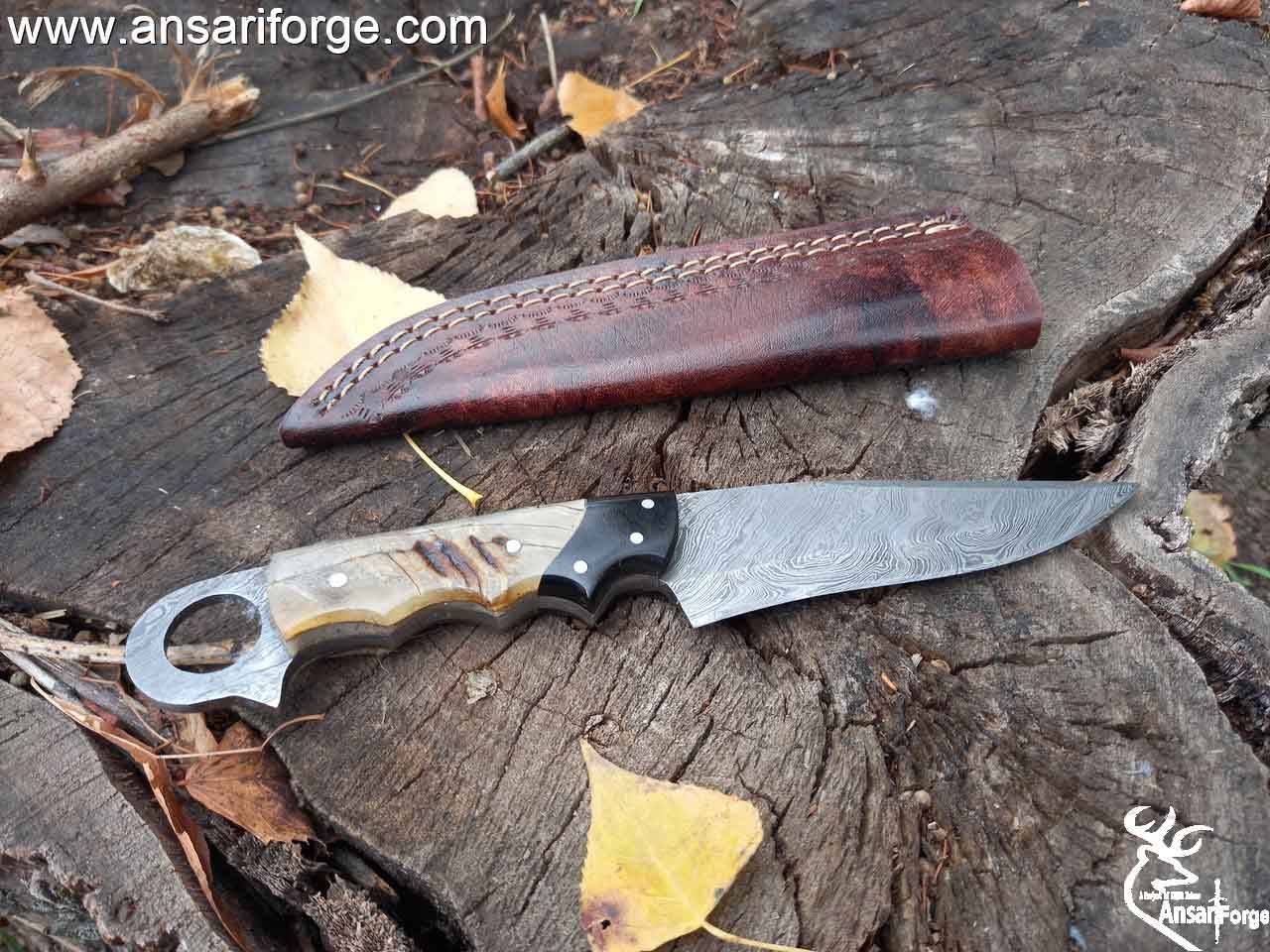 Damascus steel fixed blade hunting knife horn handle and leather sheath