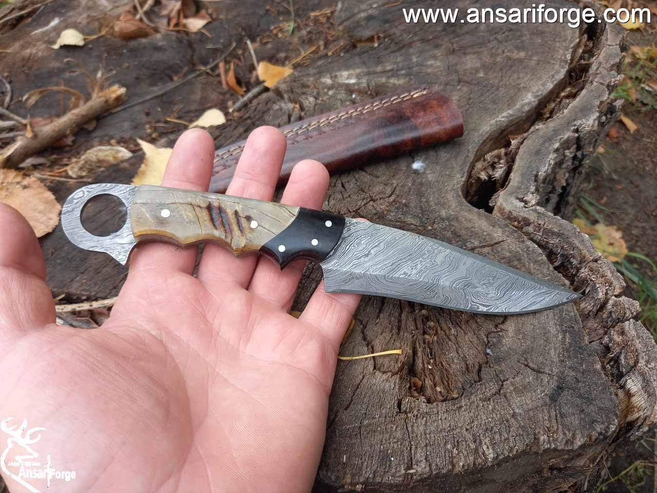 Damascus steel fixed blade hunting knife horn handle and leather sheath