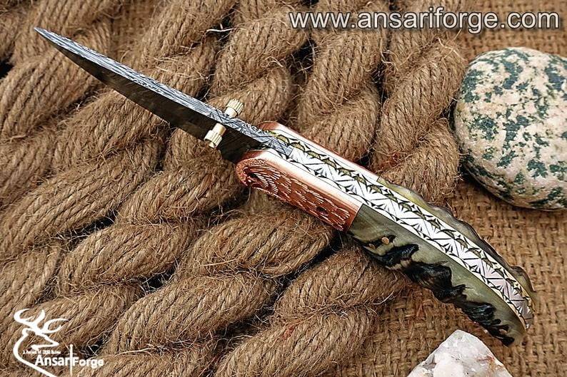 Himalayan ram horn Damascus steel pocket knife