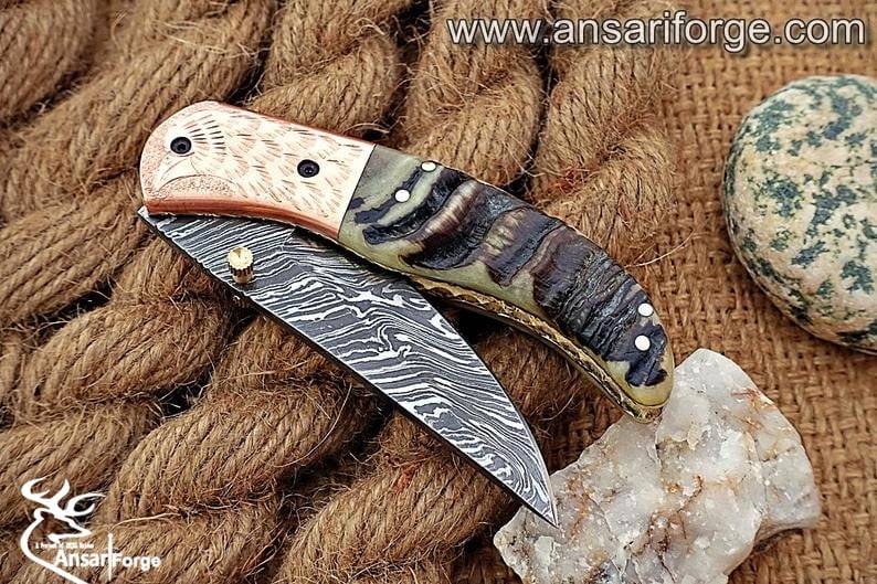 Himalayan ram horn Damascus steel pocket knife