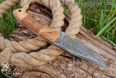 Custom Damascus Hunting Knife with hand-forged blade and olive wood handle by Ansari Forge.