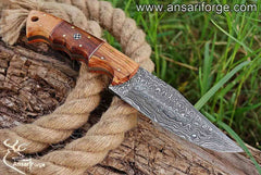 Damascus Hunting Knife with hand-forged blade and olive wood handle by Ansari Forge.