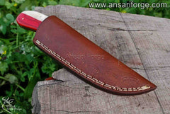 Damascus steel hunting knife with leather sheath