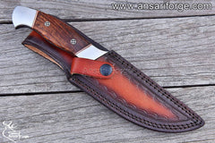 Hand-forged Damascus steel hunting knife with walnut wood handle and cowhide leather sheath.