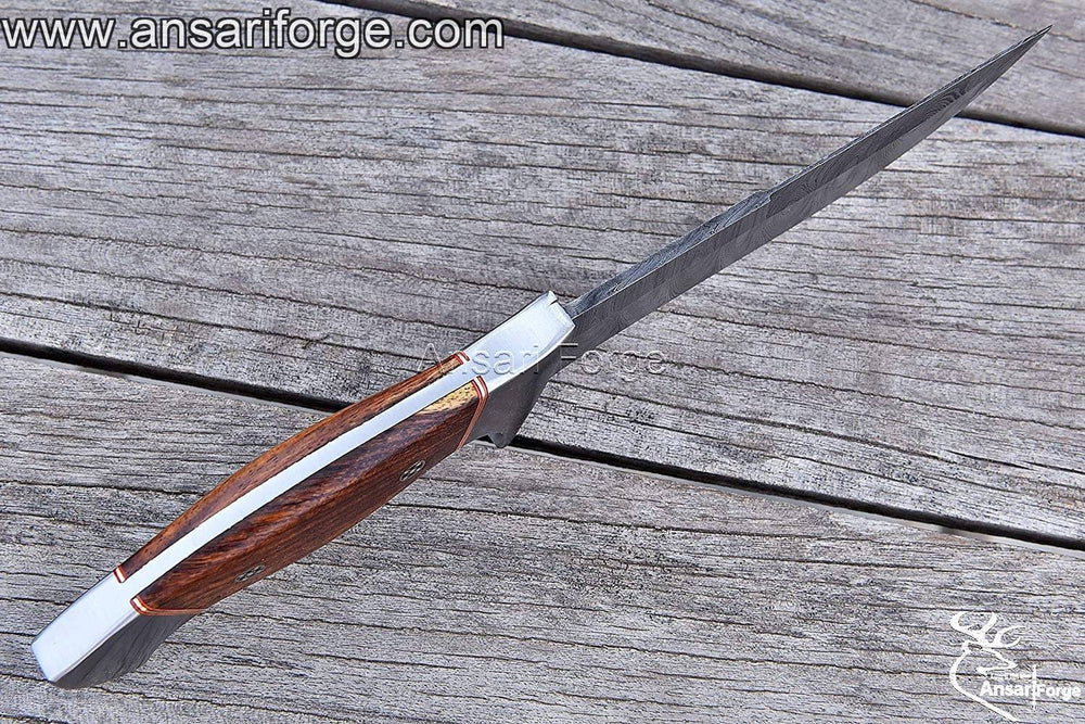 Hand-forged Damascus steel hunting knife with walnut wood handle and cowhide leather sheath.