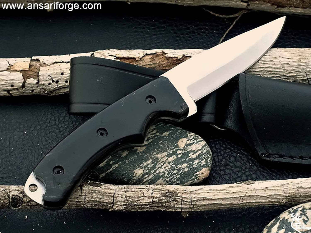 Full Tang Hunting Knife by Ansari Forge with D2 steel blade, buffalo horn handle, and leather sheath. Share New Continu