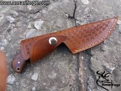 Premium Damascus Hunting Skinning Knife in a handmade leather sheath.