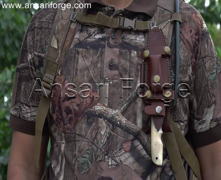Razor-sharp Damascus steel hunting knife for effortless control, featuring a comfortable camel bone handle and secure leather sheath.