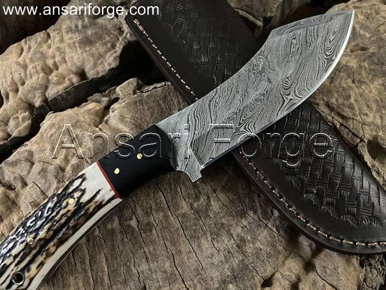 Damascus knife with antler handle