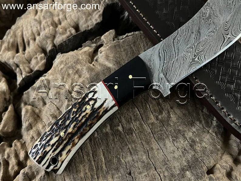 Antler handle & horn bolsters of Damascus knife