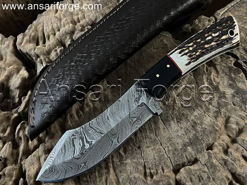 Damascus Knife with Stag Antler Handle - Exquisite blade with 512-layer twist pattern, comfortable handle, and leather sheath.