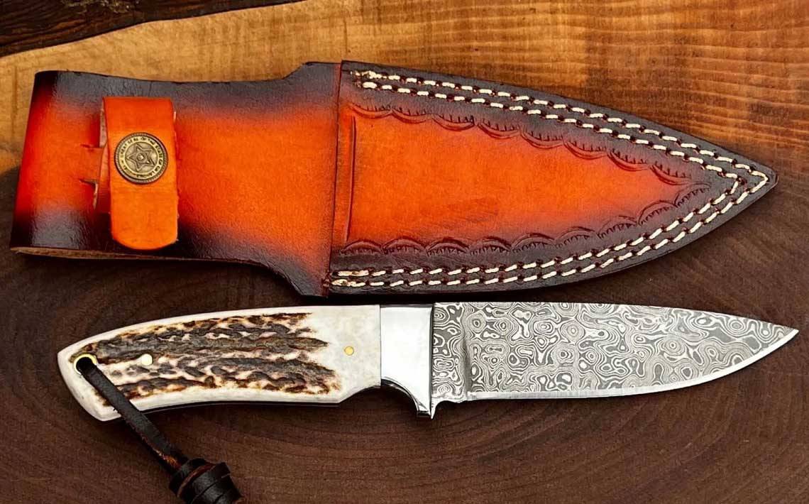 Custom Handmade Damascus Steel Hunting Knife Stag Handle And Leather Sheath.