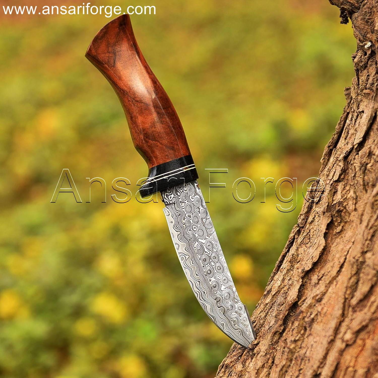 Damascus knife with rain drop pattern blade, rosewood handle, and cowhide leather sheath.