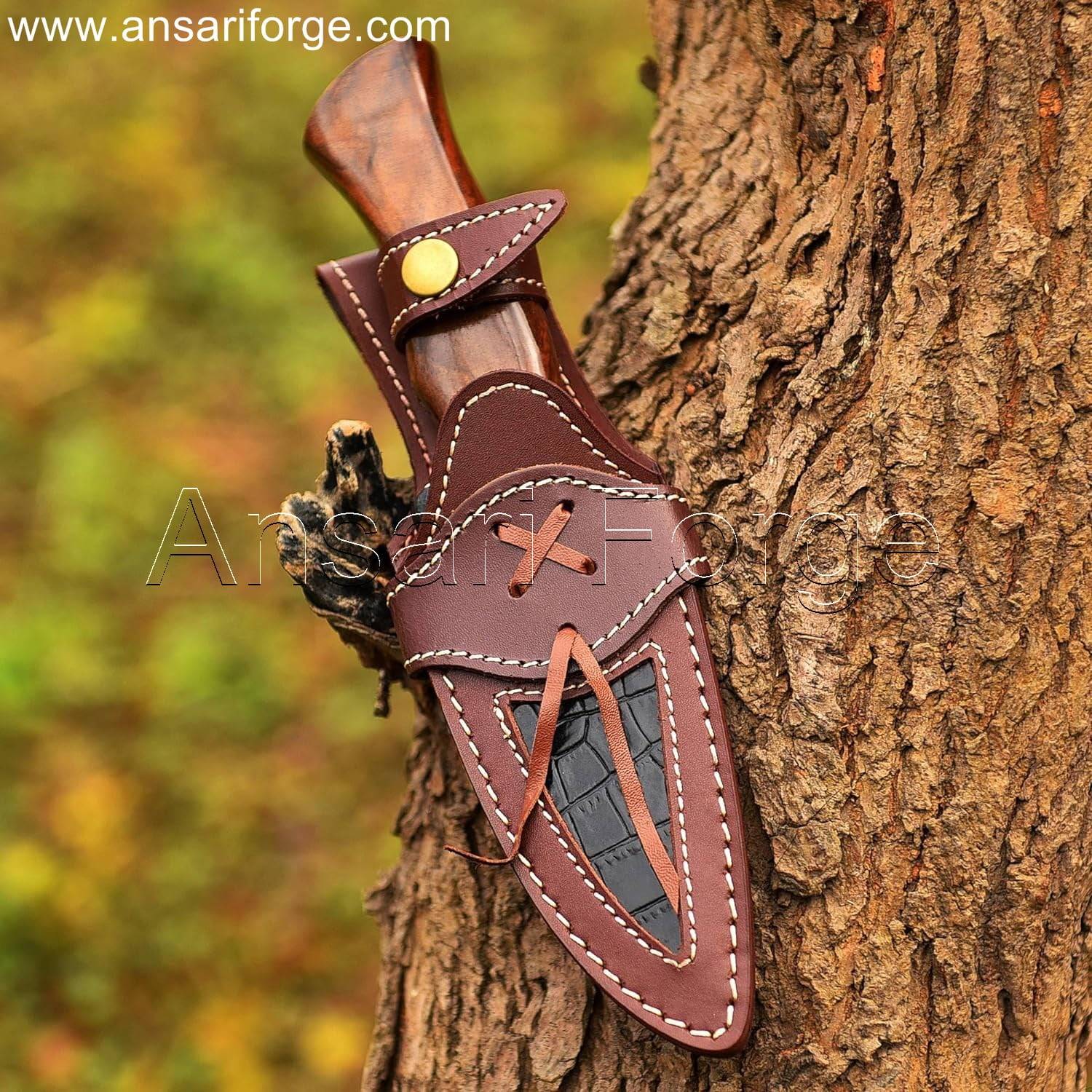 Damascus knife with rain drop pattern, rosewood handle, and cowhide leather sheath.